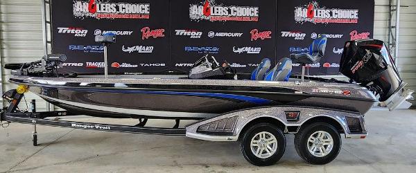 Ranger Z520 2025 Ranger Z520 bass boat with trailer, displayed indoors.