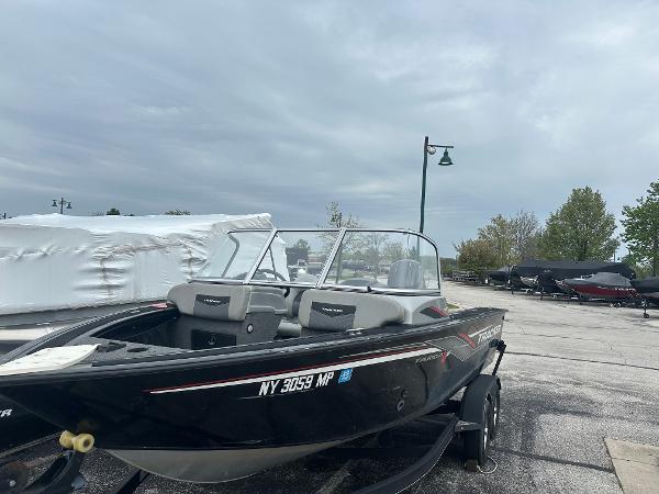 Tracker Targa V-18 WT 2019 Tracker Targa V-18 WT boat on trailer in parking lot.