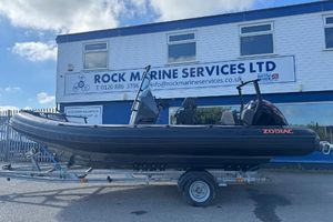 Zodiac Open 6.5 Gulfstream 2023 Zodiac Open 6.5 Gulfstream boat on trailer outside Rock Marine Services.
