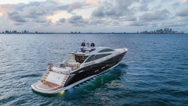 Sunseeker Predator 108 2008 Sunseeker Predator 108 yacht cruising on open water at sunset.