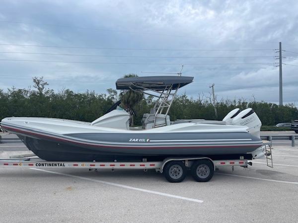 Zar Formenti 85 SL 2023 Zar Formenti 85 SL boat on trailer, parked outdoors.