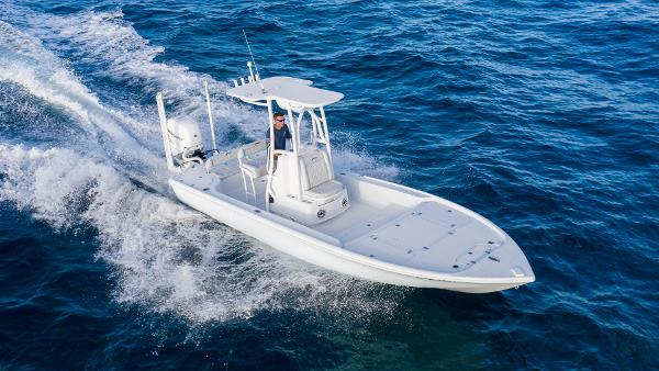 Yellowfin 24 Bay CE 2025 Yellowfin 24 Bay CE boat cruising on open blue water.