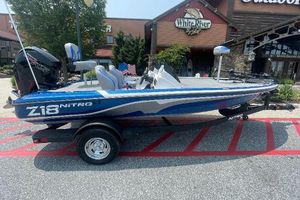 Nitro Z18 2025 Nitro Z18 boat on trailer, parked outside White River Café.