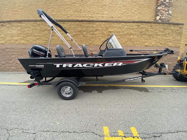 Tracker Pro Guide V-16 WT 2025 Tracker Pro Guide V-16 WT boat on trailer, parked outdoors.