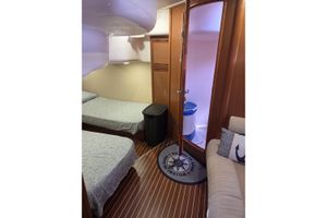 Bavaria 42 HT Interior of 2010 Bavaria Yacht 42 HT with twin beds and nautical decor.