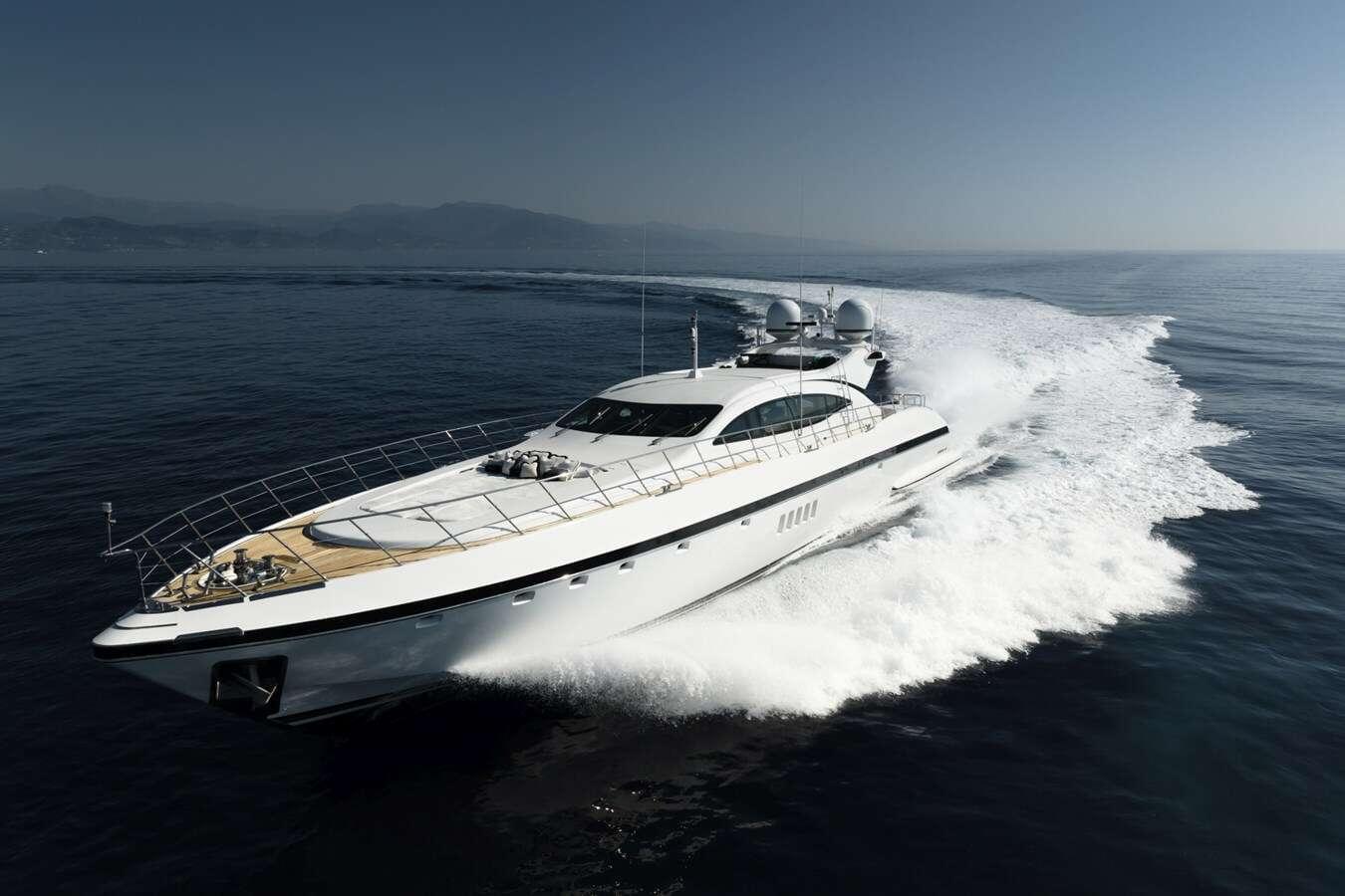 Mangusta 108 Luxurious 2008 Mangusta 108 yacht cruising on open water.