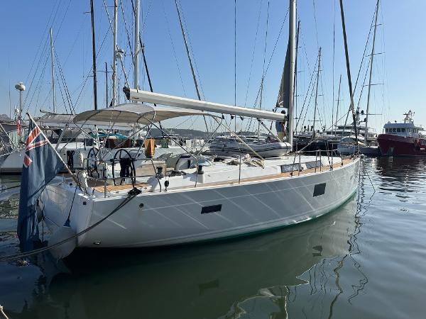 Hanse 455 2015 Hanse 455 sailboat docked in a marina, surrounded by other boats.