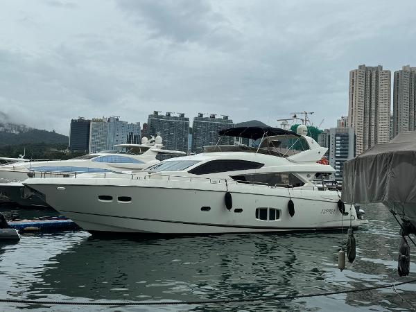 Sunseeker 2010 Sunseeker 80 Luxury 2010 Sunseeker 80 yacht docked in urban marina setting.