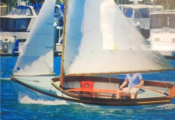 Custom Haven 12.5 1994 Custom Haven 12.5 sailboat cruising in a marina with other boats in the background.