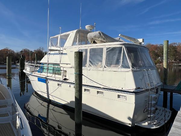 Hatteras 48 Motor Yacht 1983 Hatteras 48 Motor Yacht docked on a sunny day.