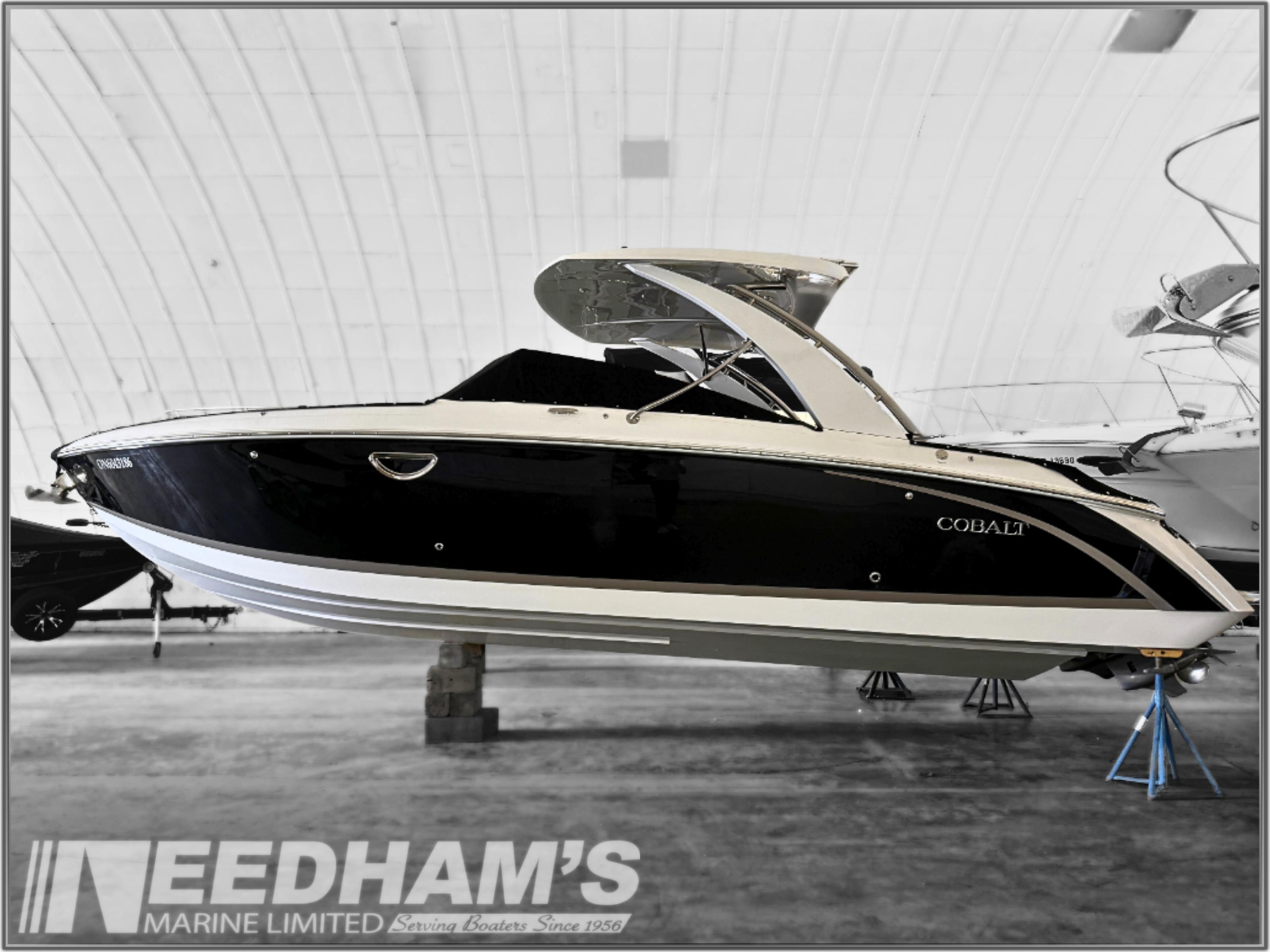 Cobalt R30 2018 Cobalt R30 boat in showroom, black and white design, displayed at Needham's Marine Limited.