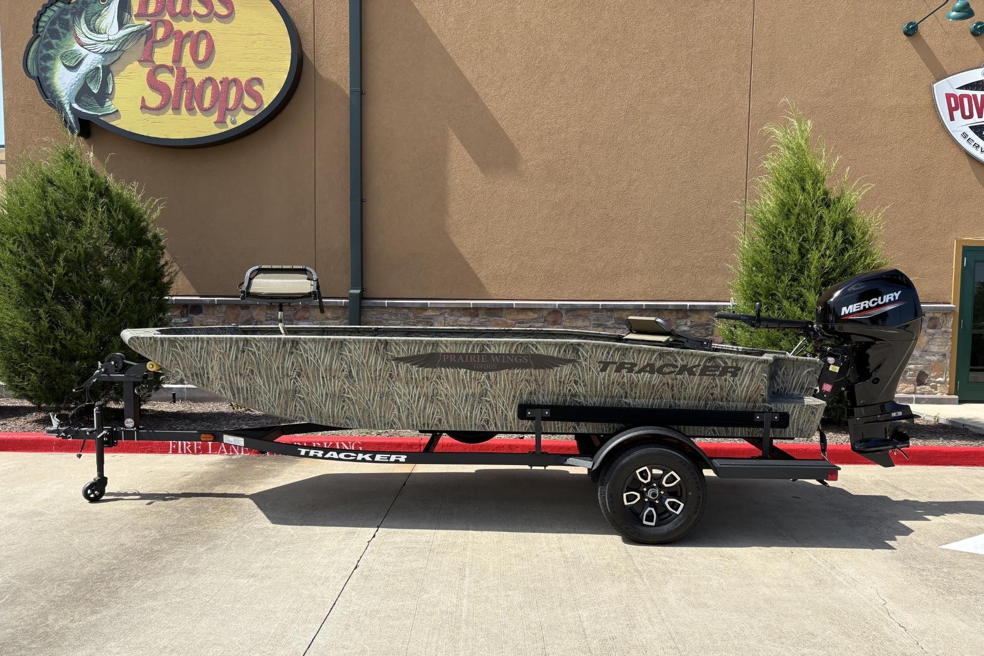 Tracker Grizzly 1650 T Prairie Wings Edition 2026 Tracker Grizzly 1650 T Prairie Wings Edition boat outside Bass Pro Shops.