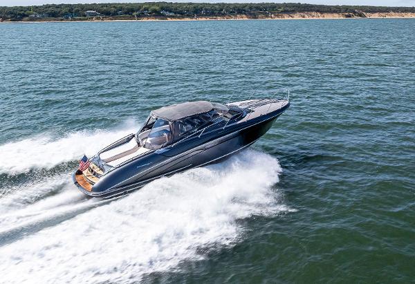 Riva RivaRama 44 2016 Riva 44 RIVARAMA SUPER luxury yacht cruising on open water.