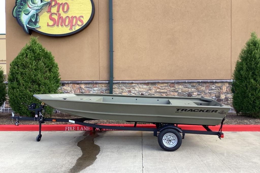 Tracker Grizzly 1648 Utility 2026 Tracker Grizzly 1648 Utility boat on trailer outside Pro Shops.