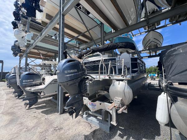 Godfrey Sweetwater 1886 C 2022 Godfrey Sweetwater 1886 C pontoon boat with Yamaha outboard motor in storage.
