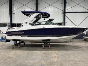 Monterey 298SS Super Sport 2023 Monterey 298 Super Sport boat in a showroom, side view.