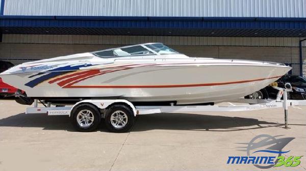 Formula 271 FASTech 2007 Formula 271 FASTech speedboat on trailer, white with red and blue accents.