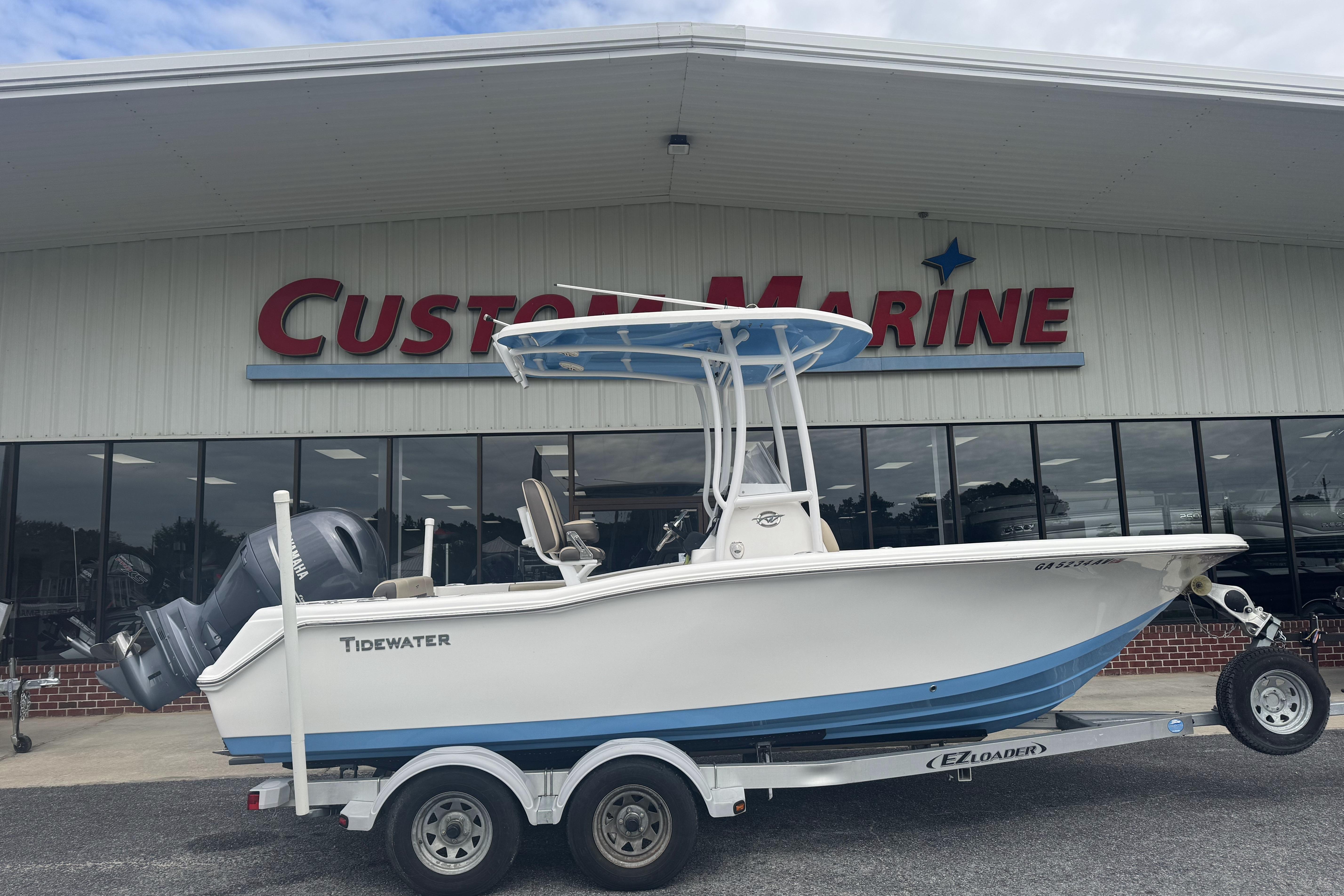 Tidewater 210 CC Adventure 2020 Tidewater 210 CC Adventure boat on trailer at Custom Marine dealership.