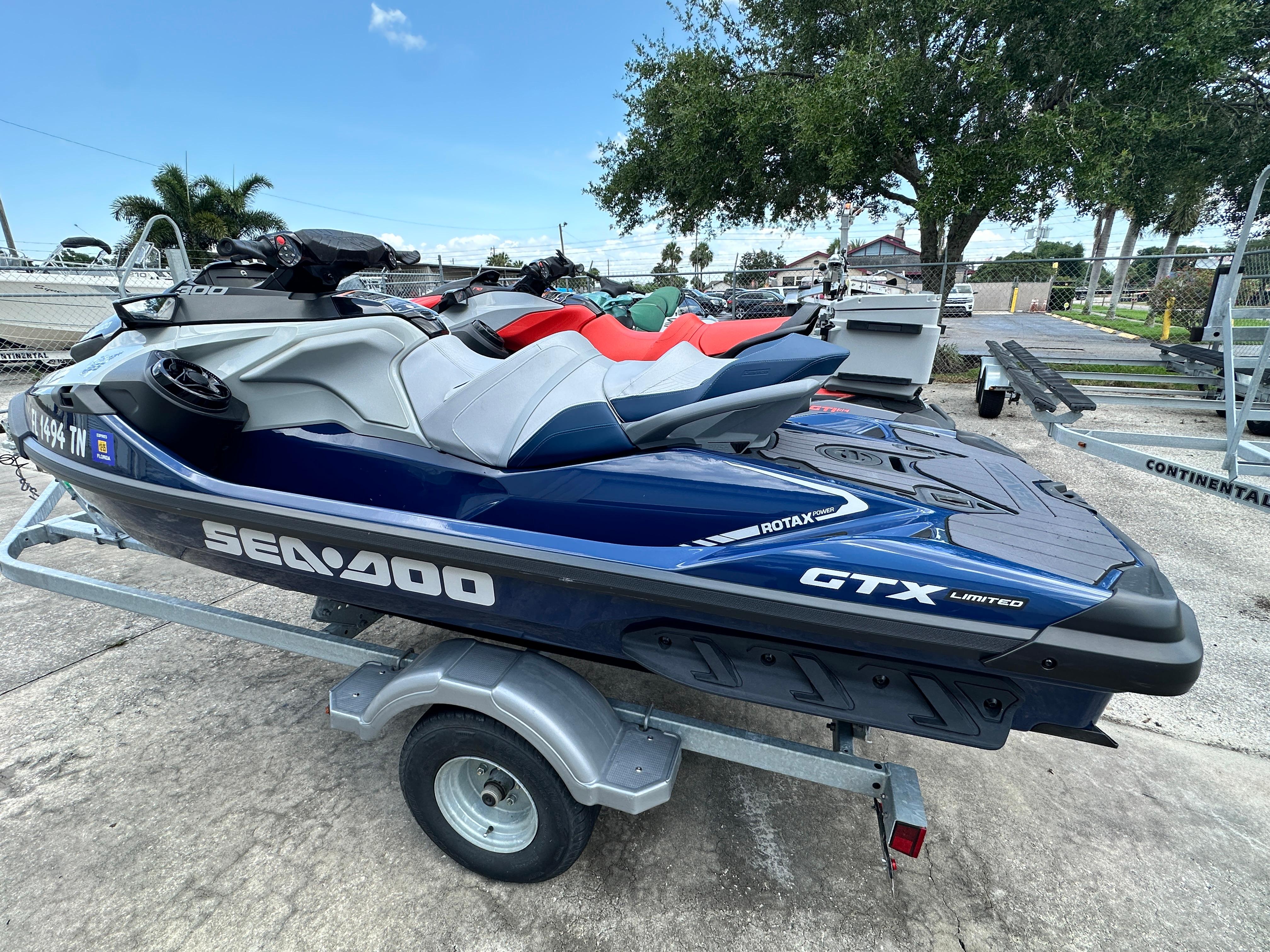 Sea-Doo GTX Limited 300 2023 Sea-Doo GTX Limited 300 jet ski on trailer, parked outdoors.