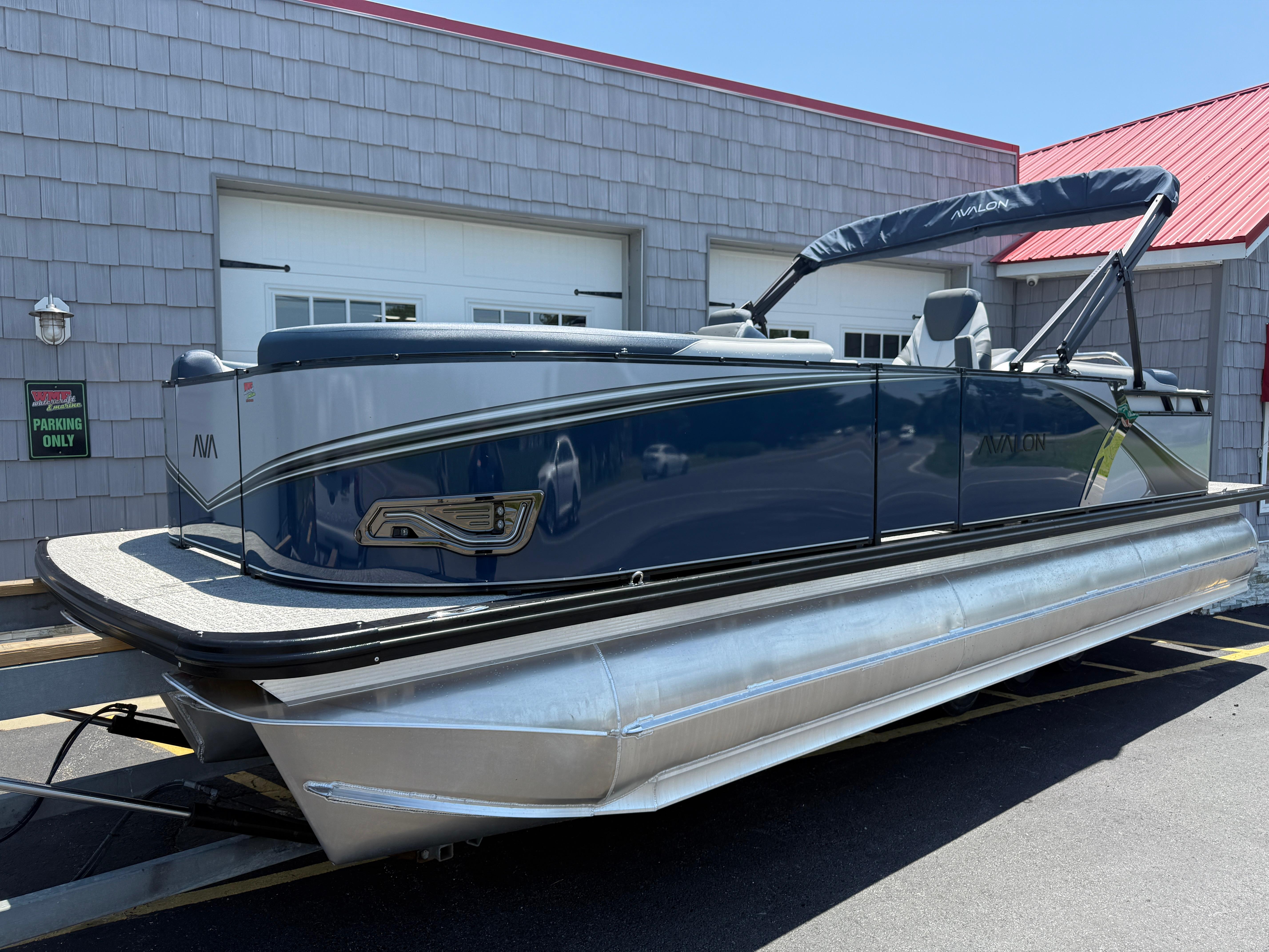 Avalon LSZ Quad Lounger - 24' Tri Toon High Performance 2025 Avalon LSZ Quad Lounger 24' Tri Toon High Performance boat on trailer.