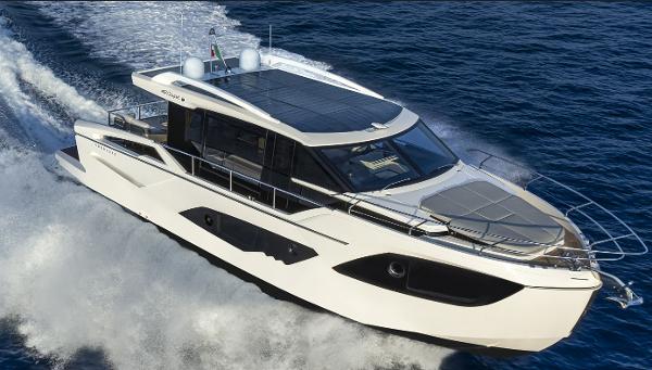 Absolute 48 Coupe 2024 Absolute 48 Coupe luxury yacht cruising on the ocean.