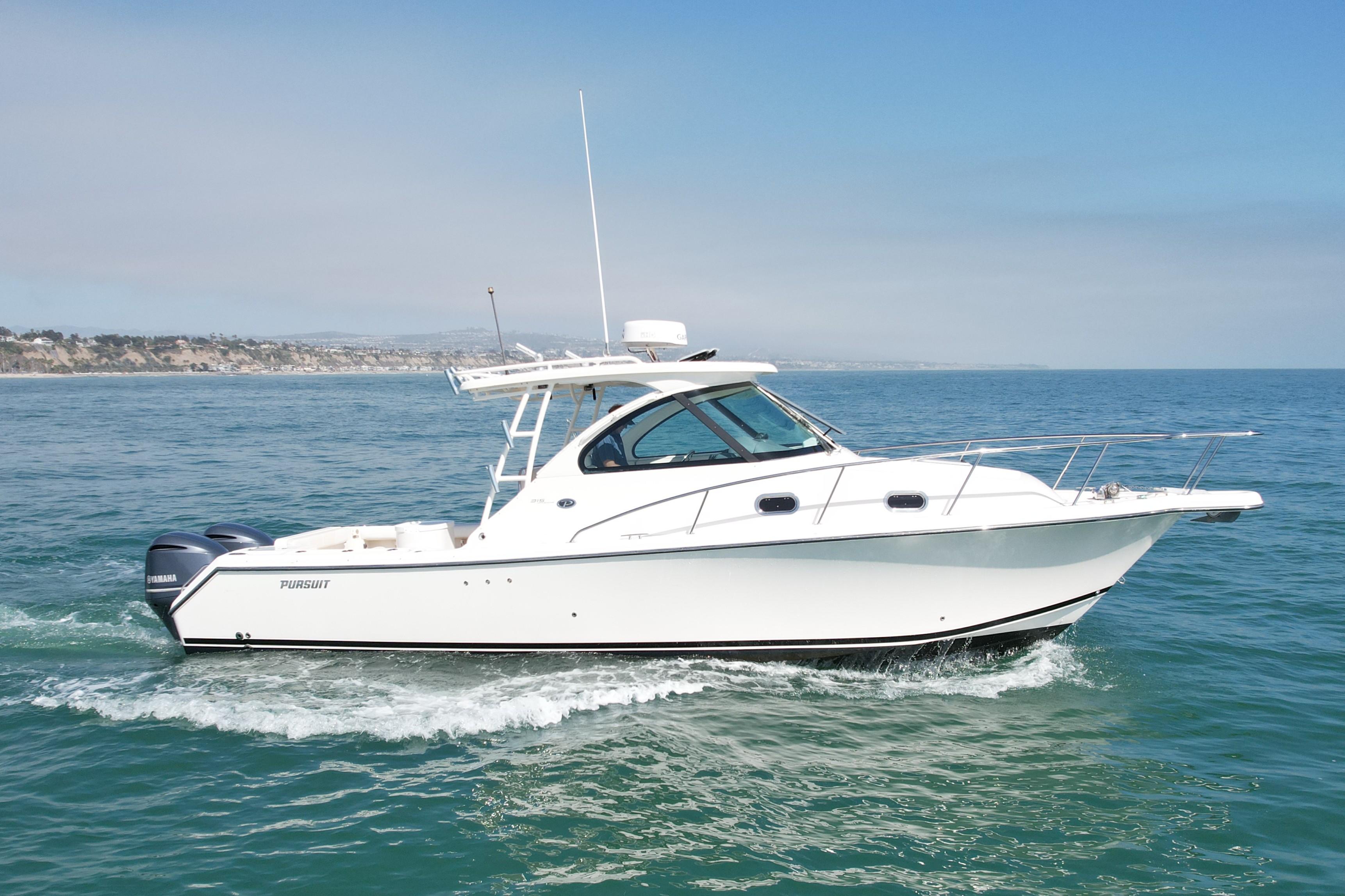 Pursuit 315 Offshore 2011 Pursuit 315 Offshore boat cruising on open water.