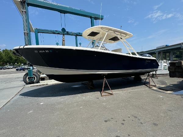 Pursuit S 280 Sport 2014 Pursuit S 280 Sport boat on stands at a marina.