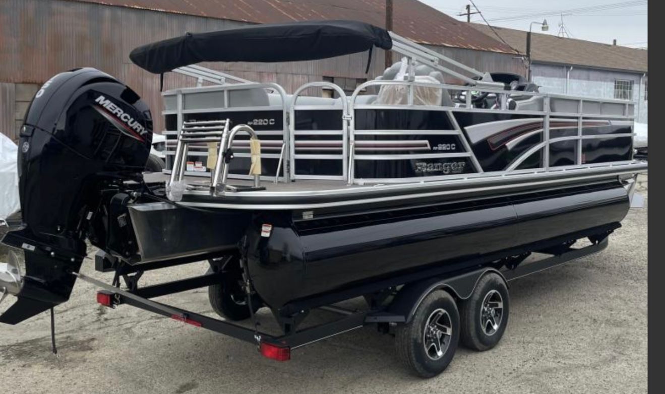 Ranger Reata 220C 2023 Ranger RP220C pontoon boat with Mercury engine on trailer.