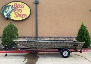 Tracker Grizzly 1860 Utility 2025 Tracker GRIZZLY 1860 Utility boat on trailer at Bass Pro Shops.