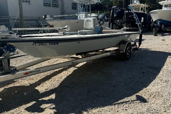 Maverick 18 HPX-V 2016 Maverick 18 HPX-V boat on trailer in a sunny outdoor setting.