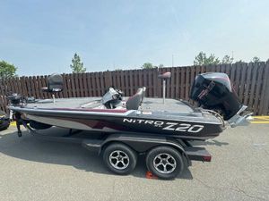 Nitro Z20 XL Pro 2025 Nitro Z20 XL Pro bass boat on trailer, parked outdoors.