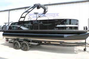 Sylvan L3 CLZ DH 2025 Sylvan L3 CLZ DH pontoon boat on trailer, sleek black design.