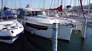 Delphia 1100 S ESCAPE 2015 Delphia 1100 S ESCAPE yacht docked in a marina, surrounded by other boats.