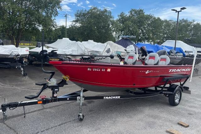 Tracker Pro Guide V-16 SC 2016 Tracker Pro Guide V-16 SC boat on trailer, parked outdoors.