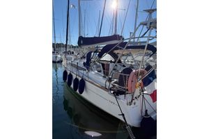 Jeanneau Sun Odyssey 349 2020 Jeanneau Sun Odyssey 349 sailboat docked in marina, sunny day.