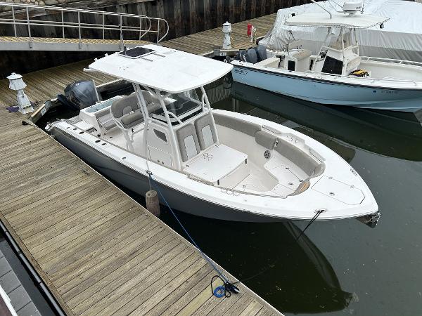 Sea Fox 266 Commander 2018 Sea Fox 266 Commander boat docked at marina, side view.