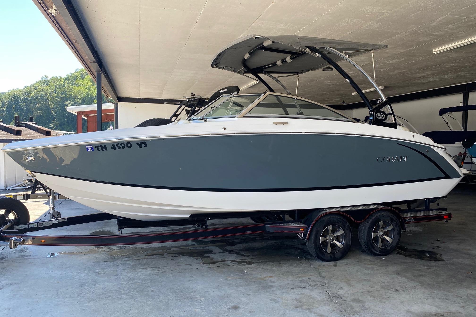 Cobalt R3 2021 Cobalt R3 boat on trailer in covered storage area.