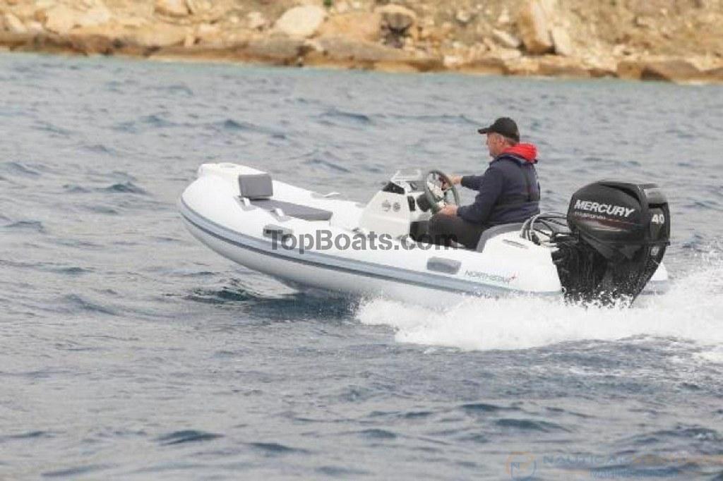 Northstar Axis 3.1 2022 Northstar Axs 3.1 boat with Mercury engine cruising on water.