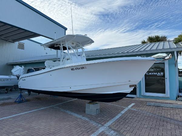 Edgewater 245CC 2021 Edgewater 245CC boat displayed outdoors on a stand.