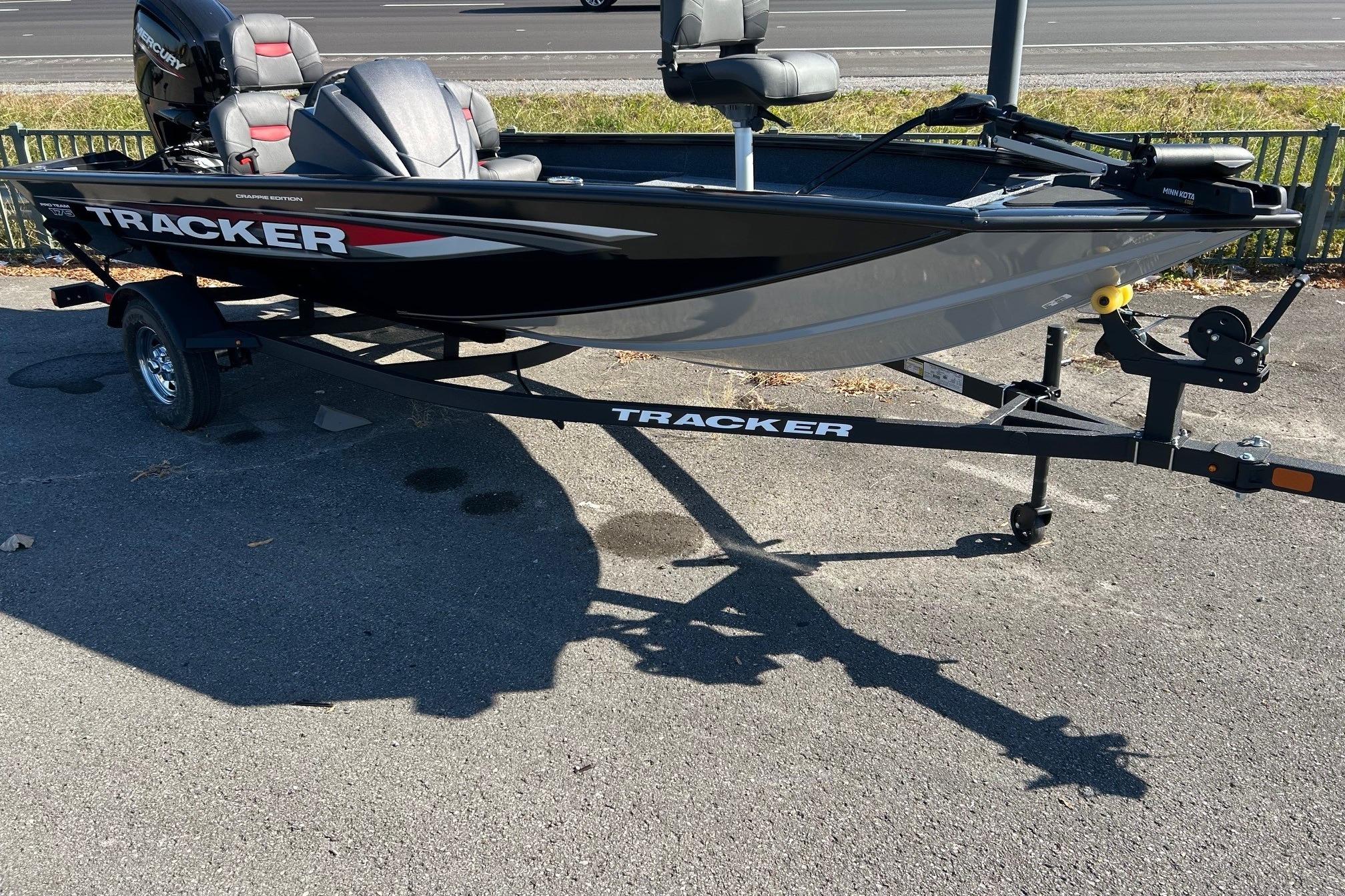 Tracker Pro Team 175 Crappie Edition 2026 Tracker Pro Team 175 Crappie Edition boat on trailer, parked outdoors.
