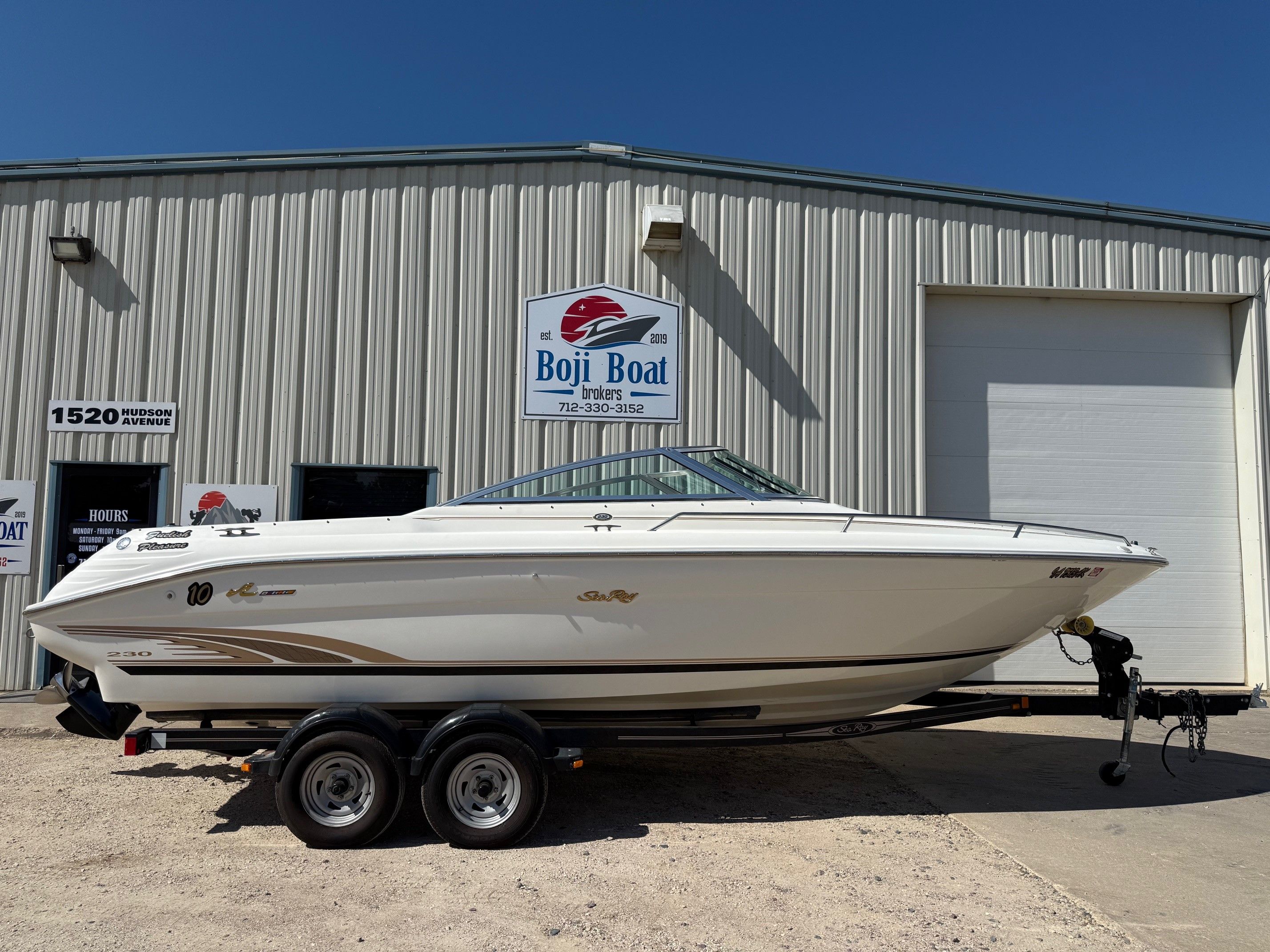 Sea Ray 230 Bow Rider 2000 Sea Ray 230 Bow Rider boat on trailer at Boji Boat Brokers.