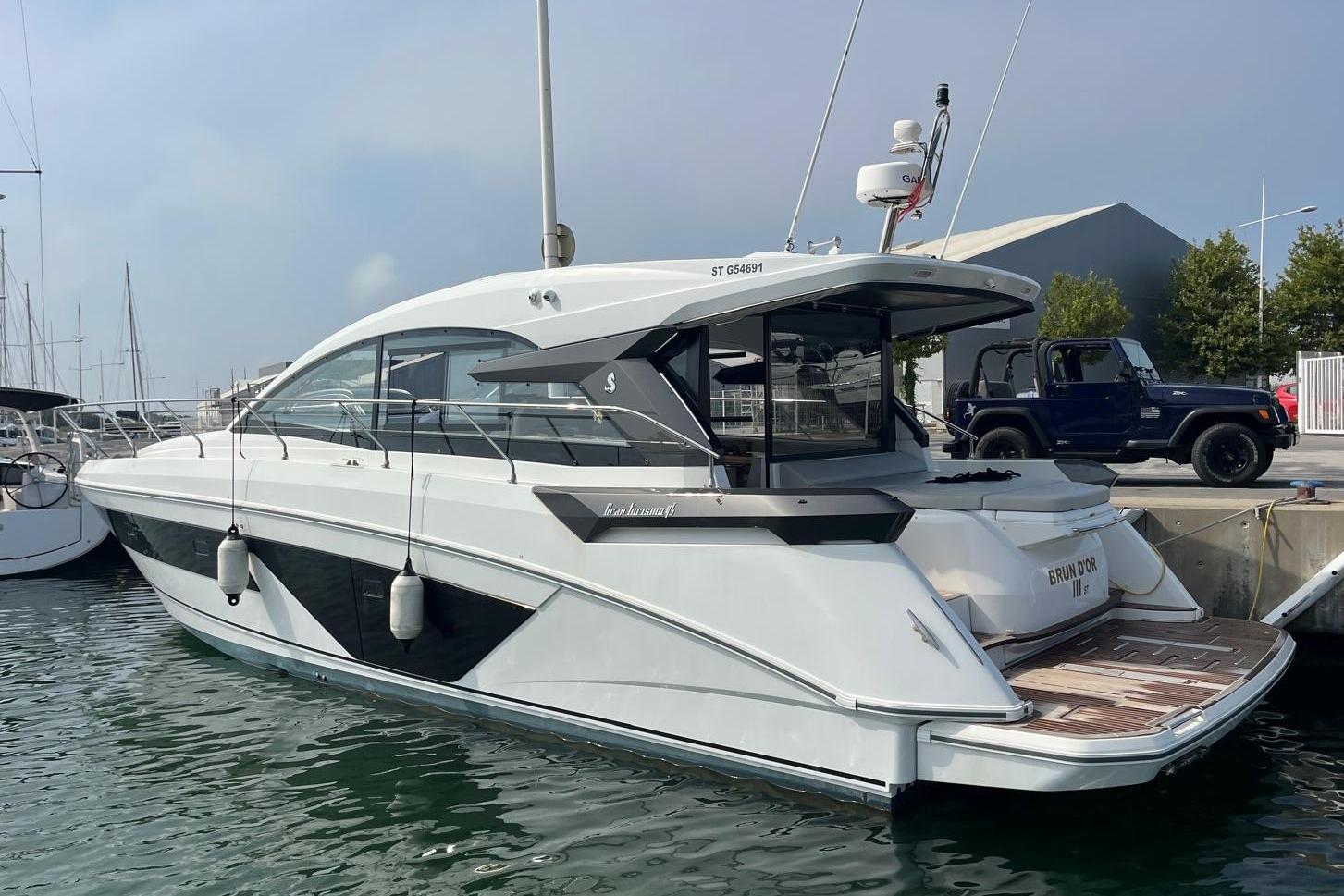 Beneteau Gran Turismo 45 2023 Beneteau Gran Turismo 45 yacht docked at marina, sleek design, modern features.