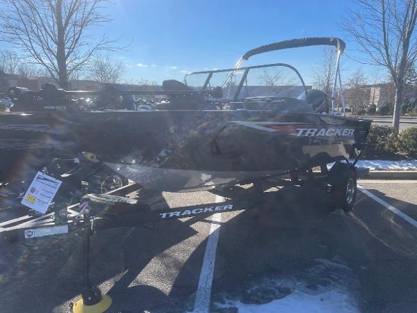 Tracker Pro Guide V-175 Combo 2025 Tracker Pro Guide V-175 Combo boat on trailer in parking lot.