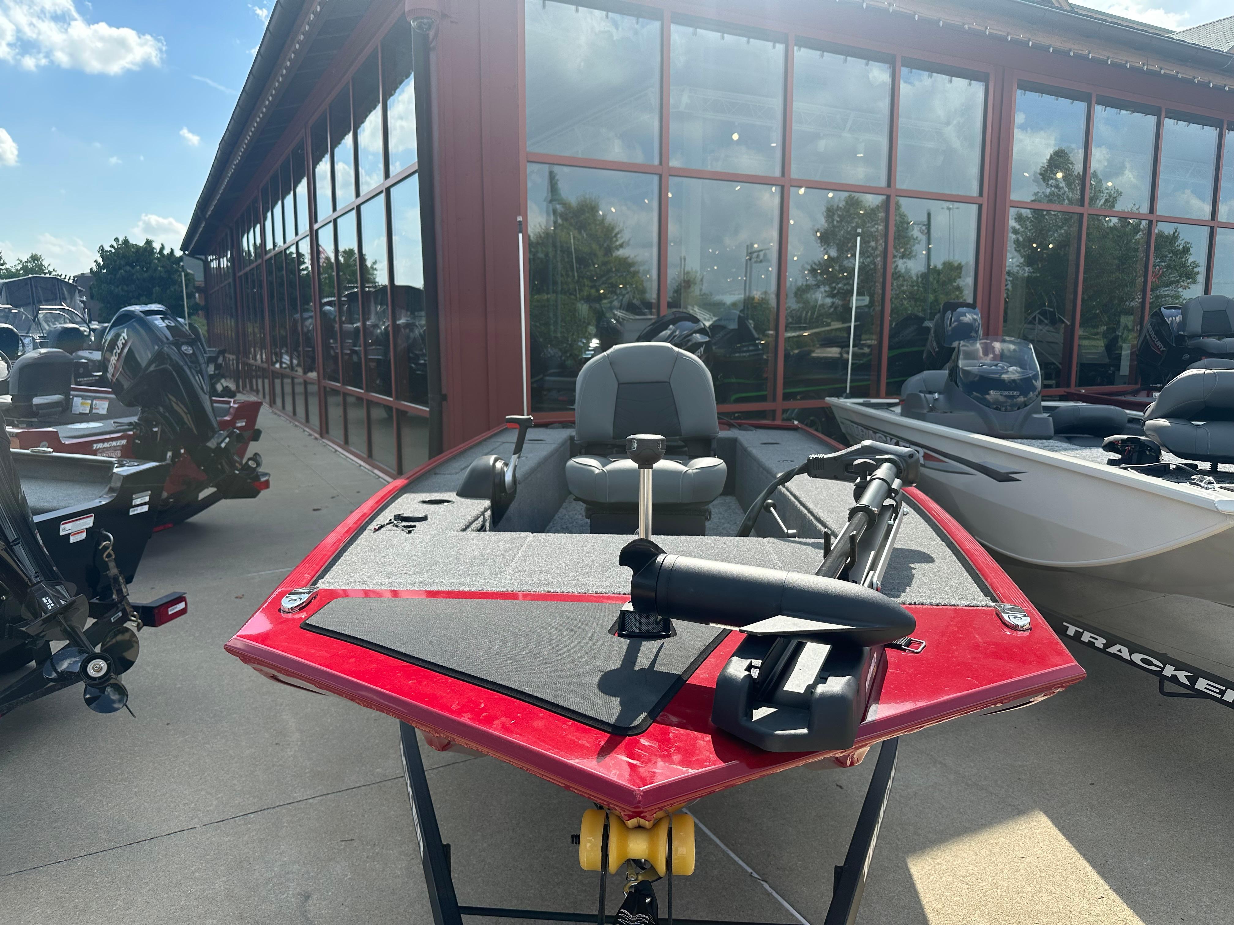 Tracker Panfish 17 2025 Tracker Panfish 17 boat with red exterior displayed outdoors.