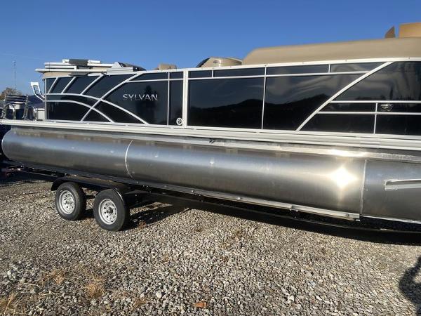Sylvan Mirage 8524 LZ 2023 Sylvan Mirage 8524 LZ pontoon boat on a trailer.