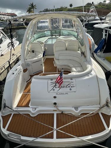 Sea Ray 340 Sundancer 2004 Sea Ray 340 Sundancer yacht docked, featuring spacious seating and elegant design.