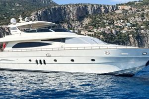 Canados 86 Luxury 2007 Canados 86 yacht cruising near scenic coastal cliffs.