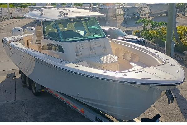 Grady-White Canyon 386 2025 Grady-White Canyon 386 boat on trailer, docked in a marina setting.