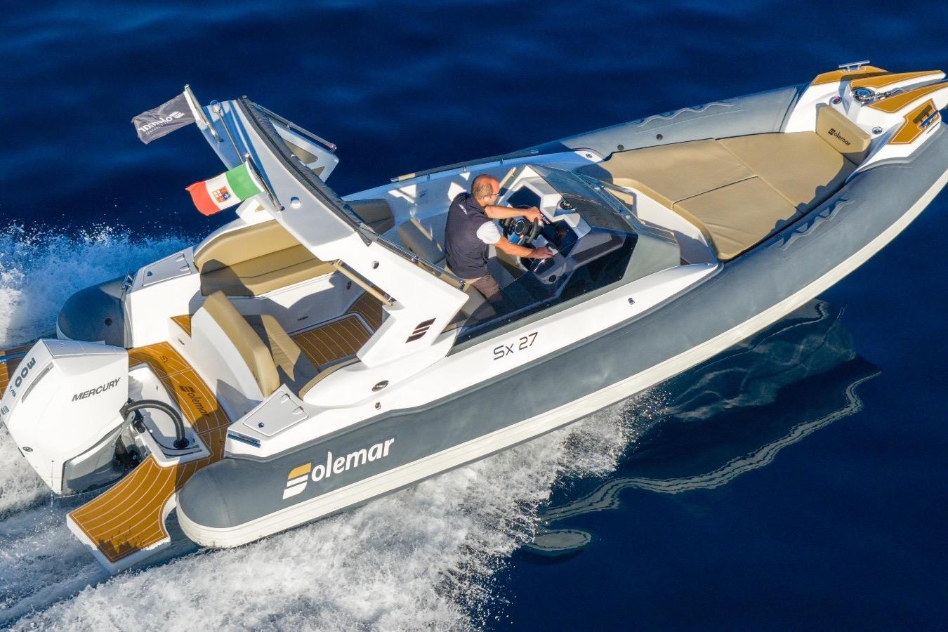 Solemar SX 27 2025 Solemar SX 27 boat cruising on blue water, featuring sleek design and powerful Mercury engine.