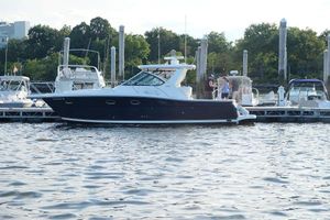 Tiara Yachts 3200 Open 2006 Tiara Yachts 3200 Open docked at marina, surrounded by other boats.